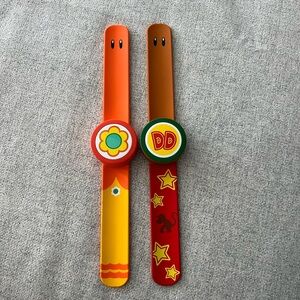 Diddy Kong and Princess Peach Power Up Bands.